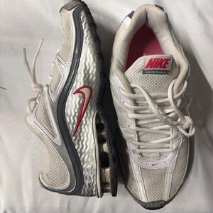 Nike White and Gray Running Shoes with Red Swoosh